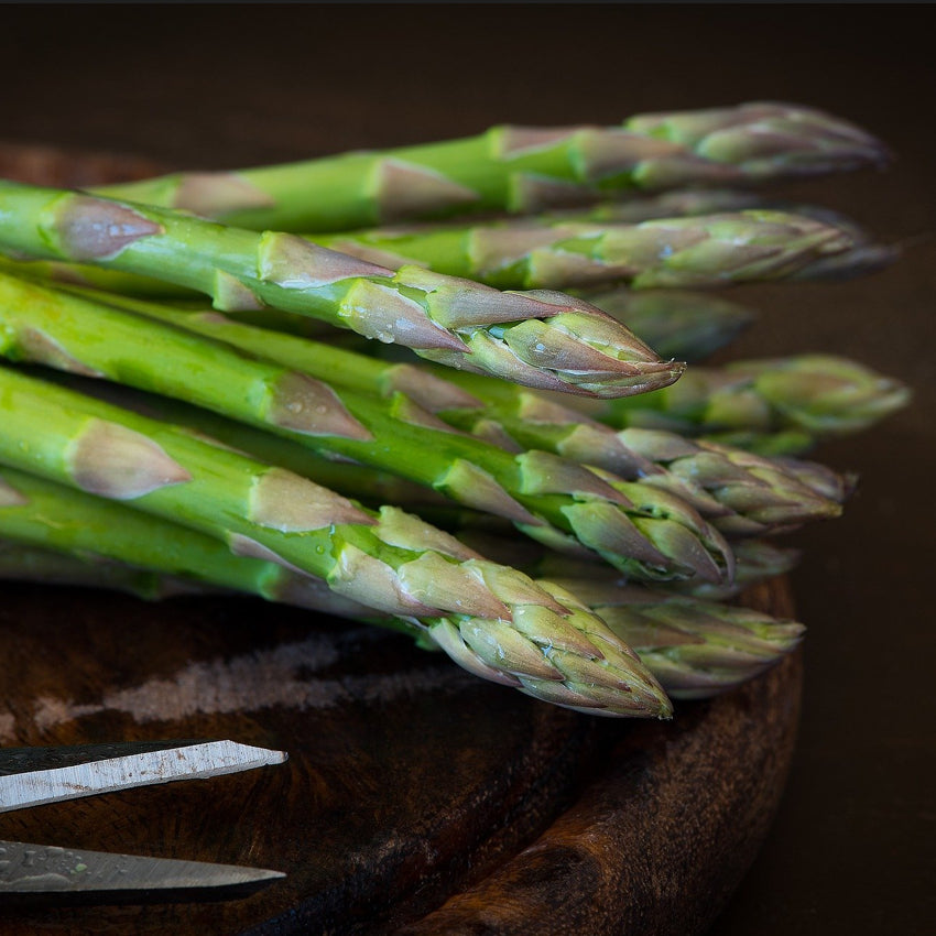 Connovers colossal asparagus spears on chopping board