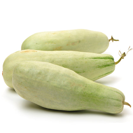 Three white cucumbers with green stripes, known as Cucumber – White Wonder, placed on a white surface.